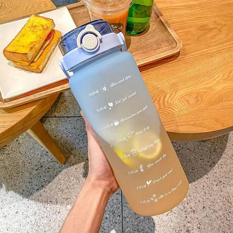 Motivational 67.7oz Water Bottle with Lid and Straw
